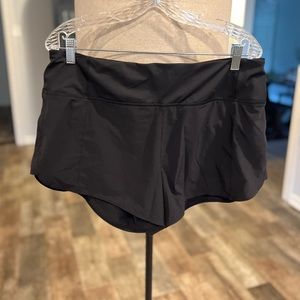 Black Athleta shorts, Size L, internal liner, zipper pocket, reflective sides
